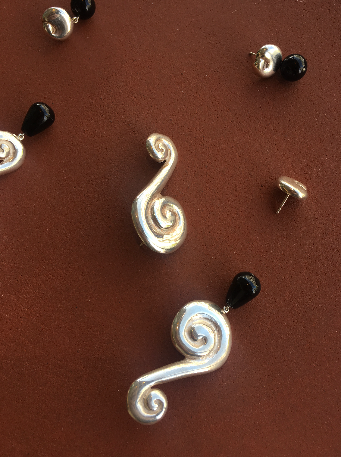 Large ? earring.